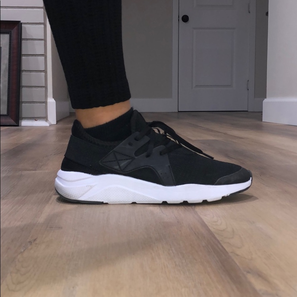 Black running shoe (fairly worn)